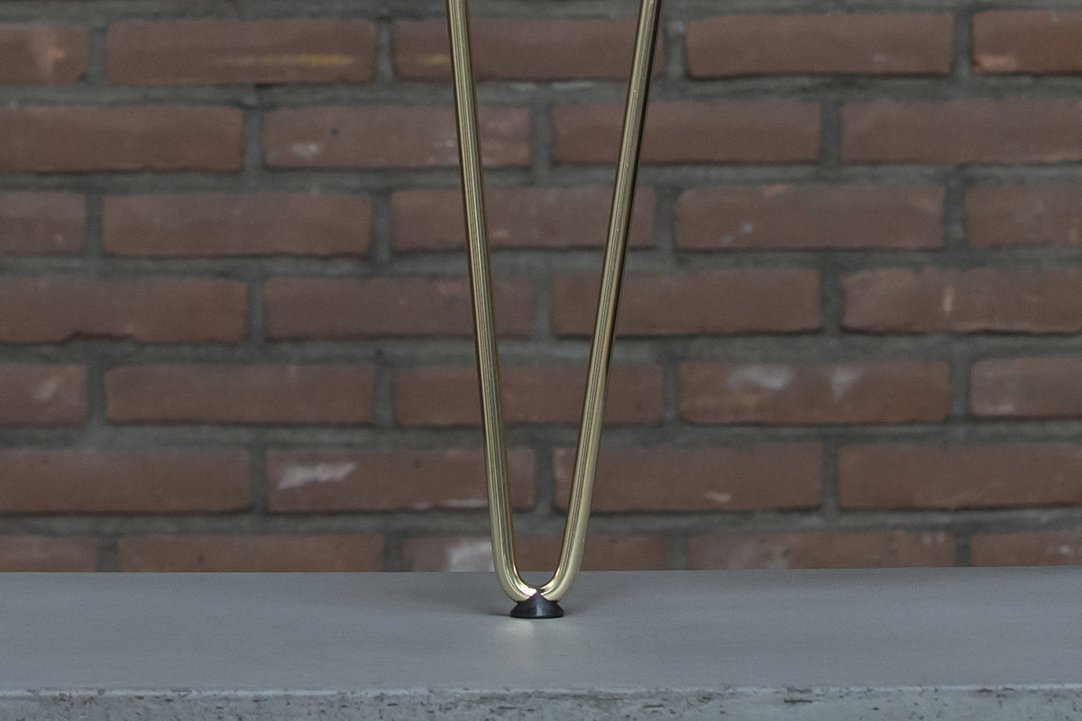 Detail van Nordstahl Hairpin meubelpoot goud