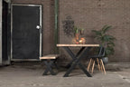 Nordstahl X leg tafelpoten in modern interieur